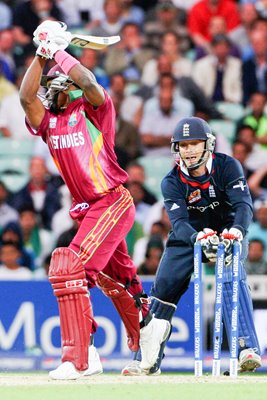 James Foster of England stumps Dwayne Bravo