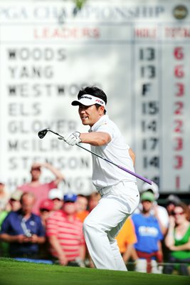 Y. E. Yang chips in for Eagle on 14