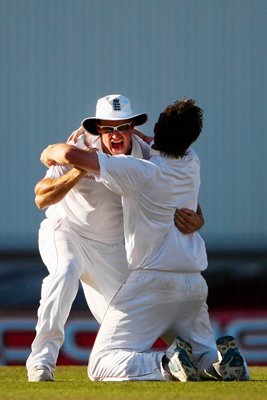 Captain and Bowler celebrate Final Wicket