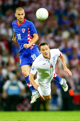 England Captain John Terry clears the ball away