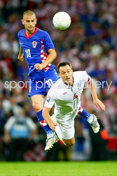 England Captain John Terry clears the ball away
