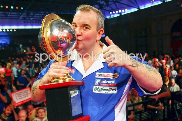 Phil Taylor of England with yet another trophy