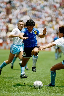 Maradona runs past England defenders 