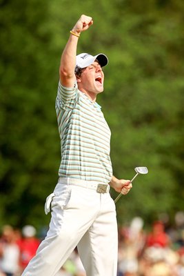 Rory McIlroy celebrates maiden US Tour win