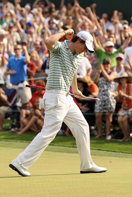 Rory McIlroy breaks course record for debut win