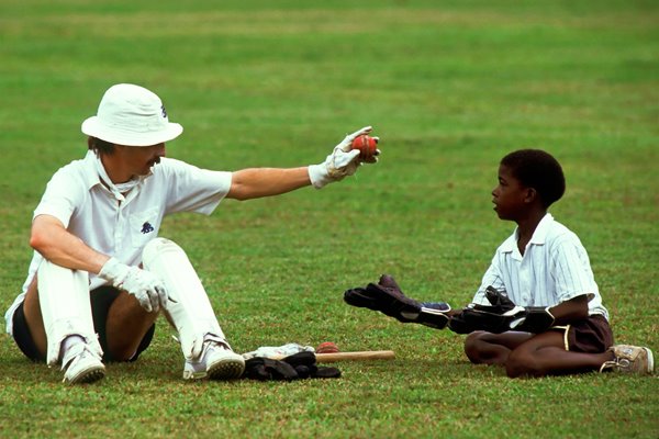 Jack Russell plays with locals