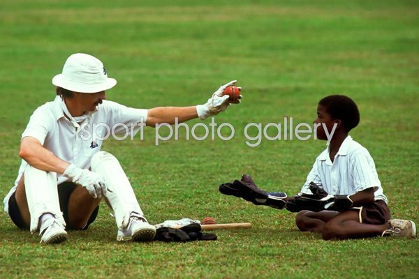 Jack Russell plays with locals