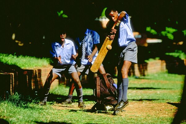 Children playing cricket in Zimbabwe 