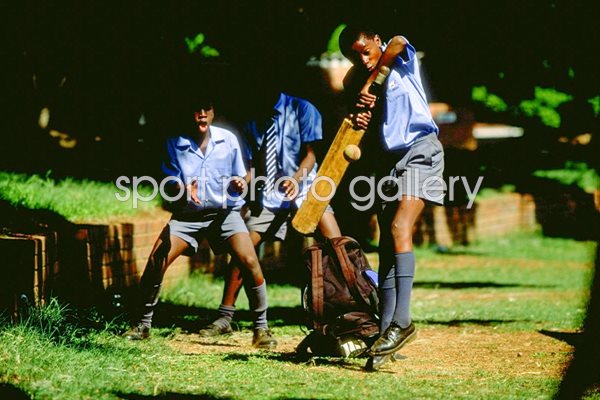 Children playing cricket in Zimbabwe 