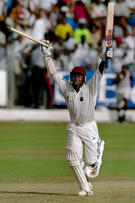 Brian Lara celebrates winning runs