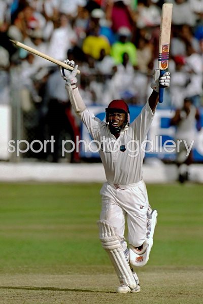 Brian Lara celebrates winning runs