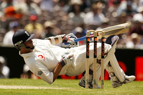 James Foster of England falls over