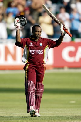 Brian Lara celebrates his century