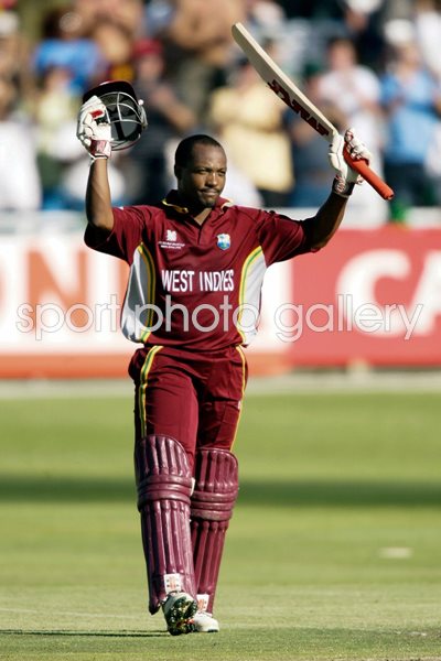 Brian Lara celebrates his century