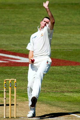 Glenn McGrath bowls 