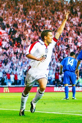 Michael Owen celebrates 