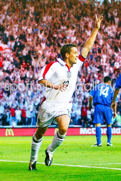 Michael Owen celebrates 