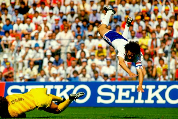 Michel Platini flies over Belgium goalkeeper