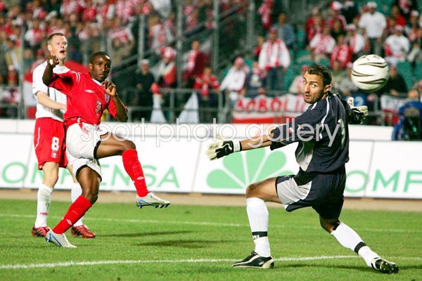 Jermain Defoe of England scores