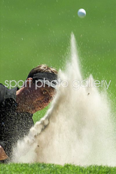 Phil Mickelson blasts from the sand 