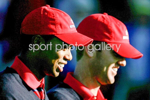 Tiger Woods and Chris Riley