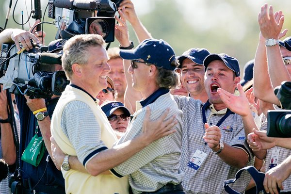 Bernhard Langer hugs Colin Montgomerie 