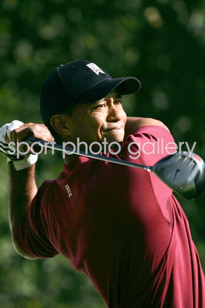 Tiger Woods hits a tee shot 
