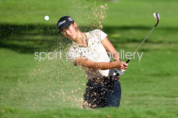 Michelle Wie hits out of a bunker 