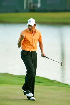 Adam Scott of Australia celebrates 