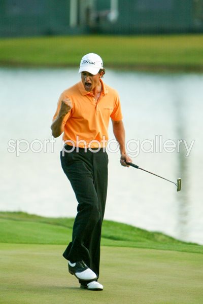 Adam Scott of Australia celebrates 