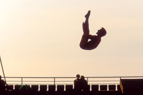 Silhouette of a diver in action 