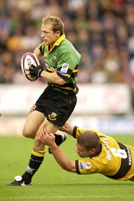 Matt Dawson is tackled by Joe Worsley