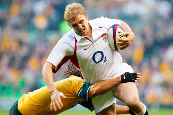 Lewis Moody is tackled by George Smith 
