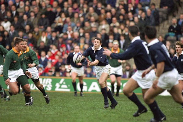 Scott Hastings passes to the Scottish backs