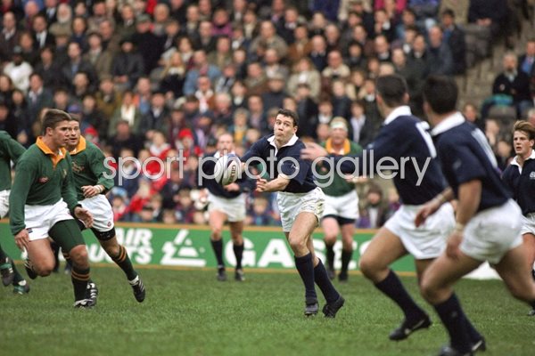 Scott Hastings passes to the Scottish backs