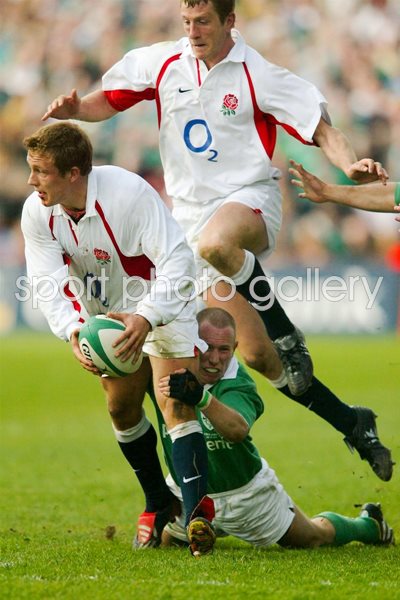 Wilkinson tackled by Stringer