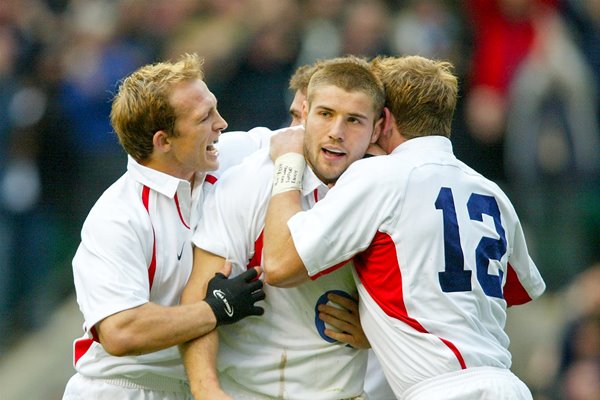 Ben Cohen of England breaks away to score the England's third try