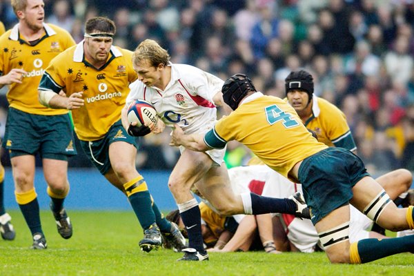 Matt Dawson of England breaks through the Australian defence