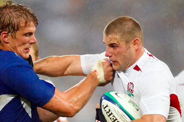 Ben Cohen fends away Aurelien Rougerie 