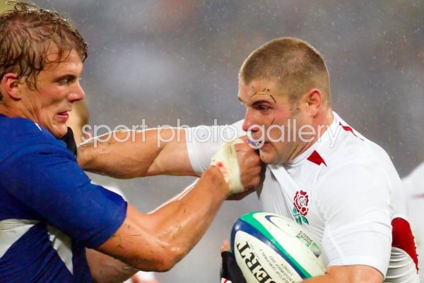 Ben Cohen fends away Aurelien Rougerie 