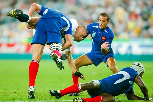 Ben Cohen of England is tackled