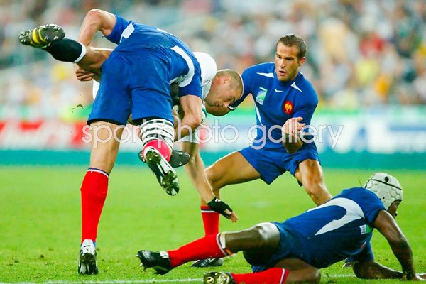 Ben Cohen of England is tackled