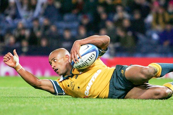 George Gregan scores