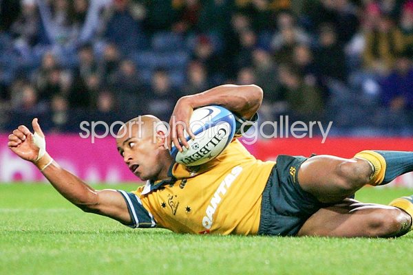 George Gregan scores