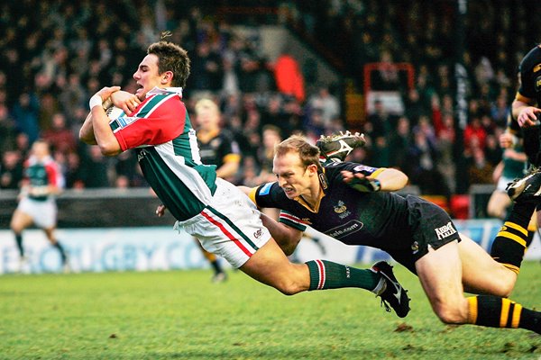 Harry Ellis of the Tigers dives over