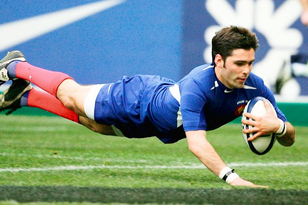 Dimitri Yachvili of France dives over 