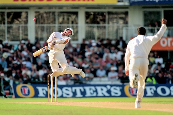 Alec Stewart avoids a Wasim Akram bouncer