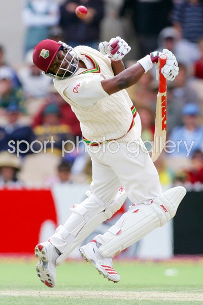 Brian Lara ducks a bouncer