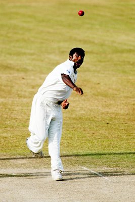 Muttiah Muralitharan of Sri Lanka bowls 