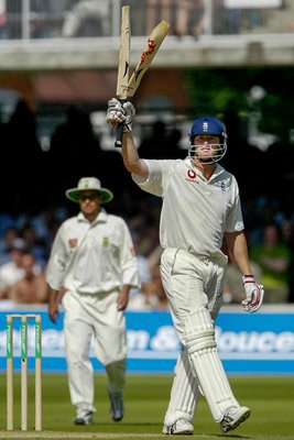 Andrew Flintoff of England holds his broken bat